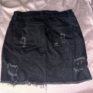 Black distressed mini skirt